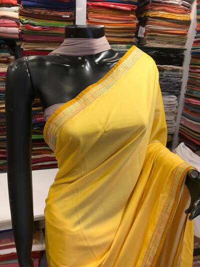 Yellow colour silk sarri with brocket blouses