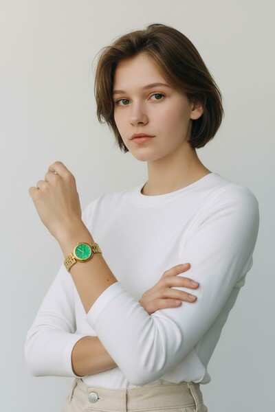 Gold pleated ladies watch 